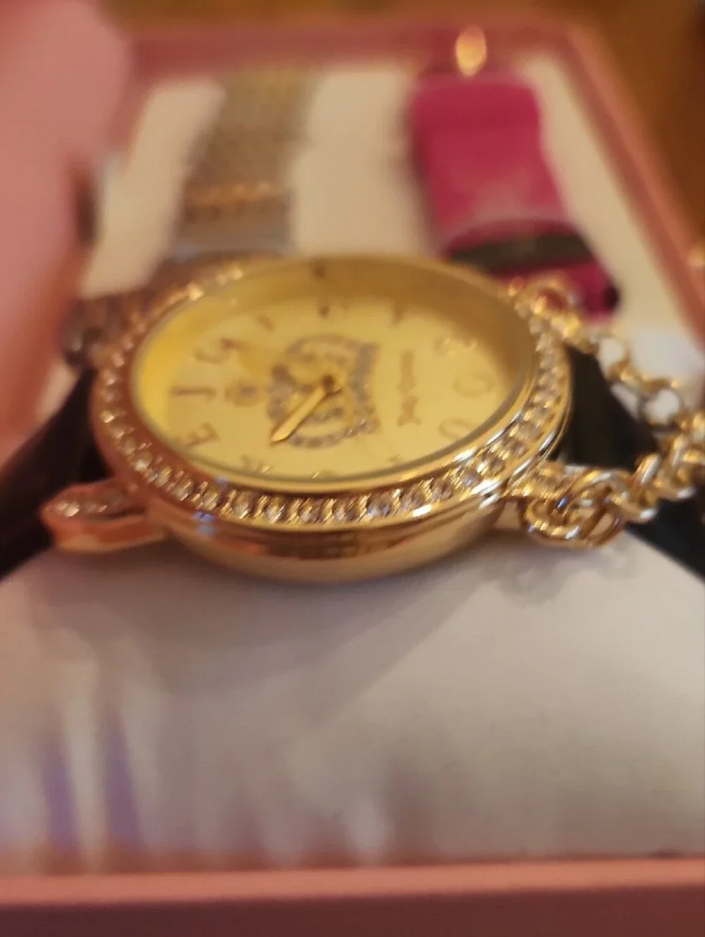 Juicy Couture gold tone